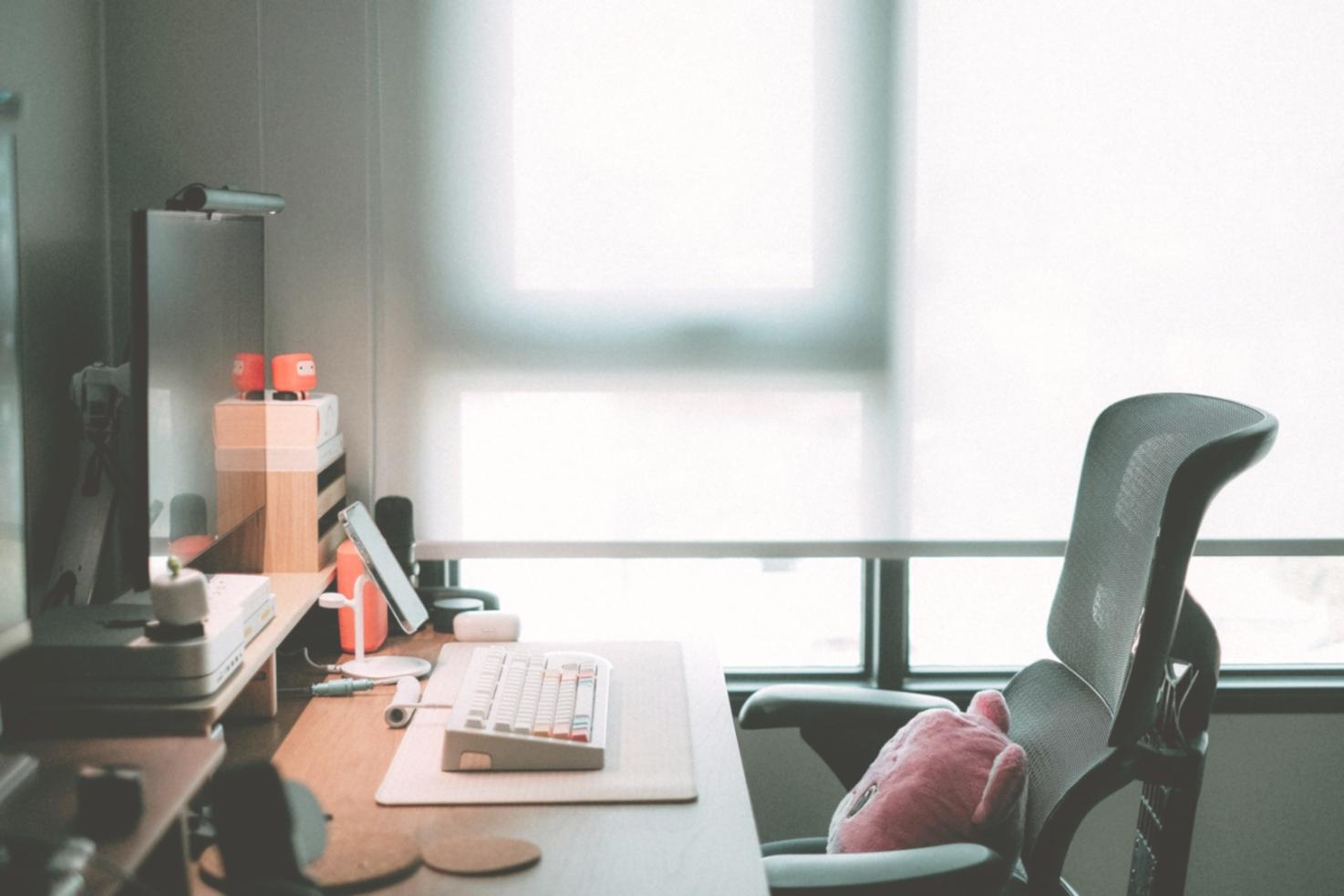 Financial advisor reviewing budget documents and charts with focused attention to detail